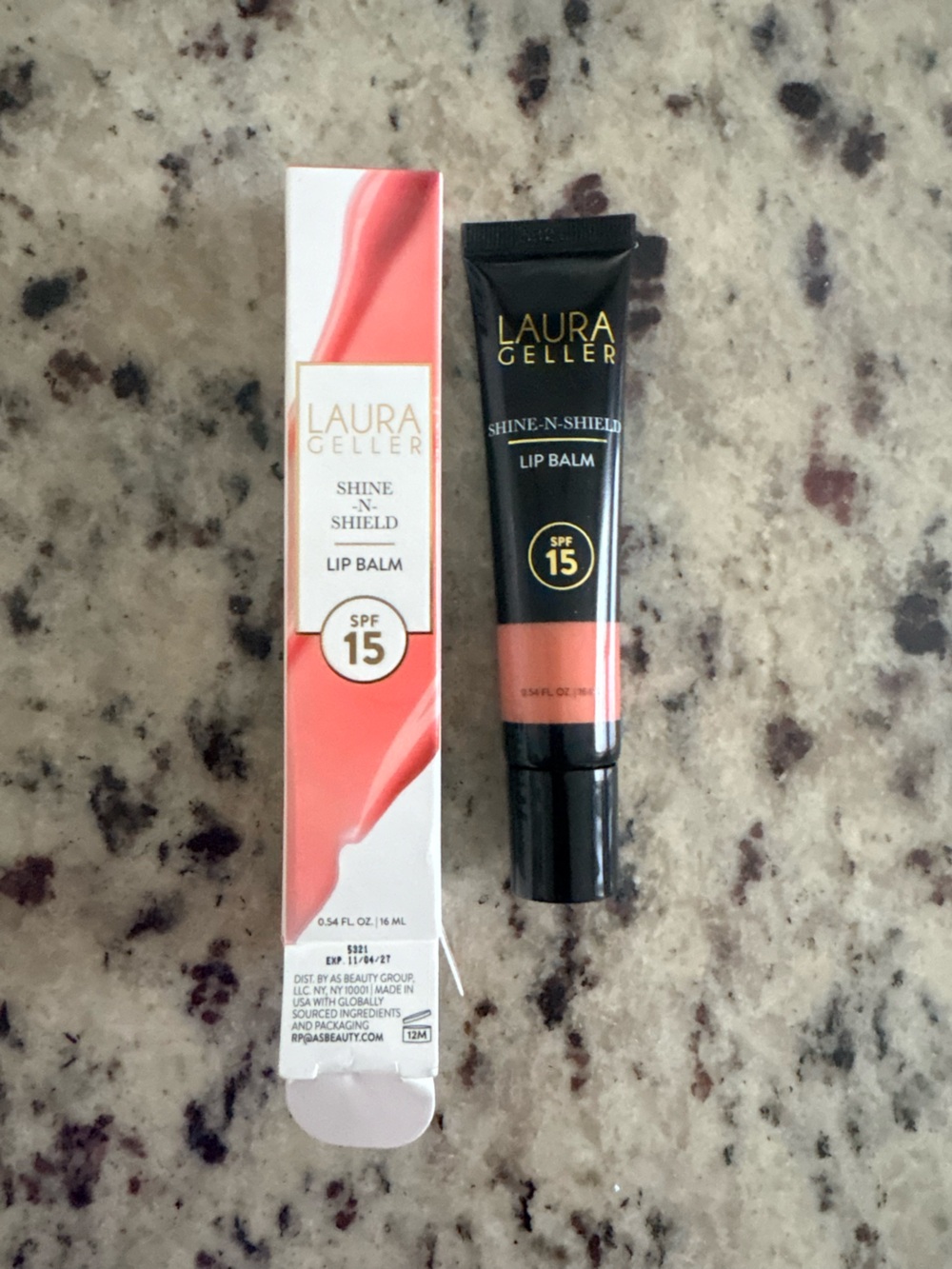 Laura Geller Shine-N-Shield Lip Balm - Coral